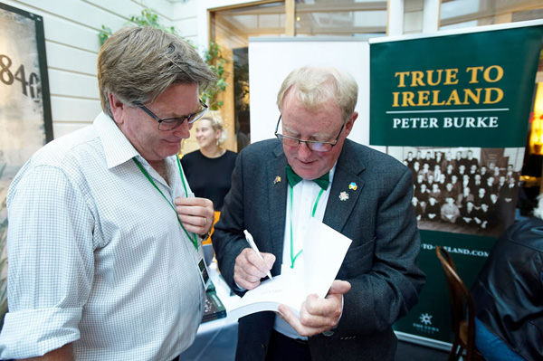 Peter Burke signing the book